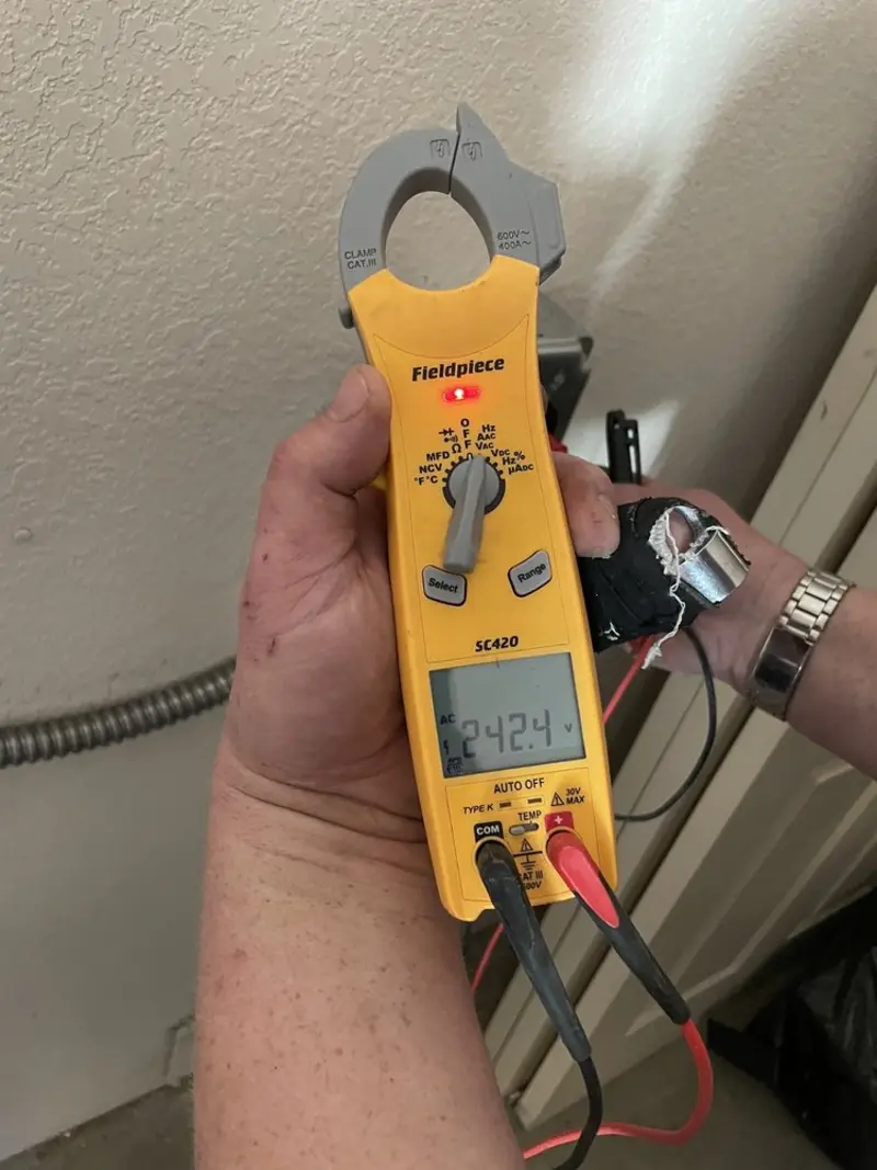 Voltage testing with clamp meter during Hot Tub / Pool Electrical Wiring in Tyrone
